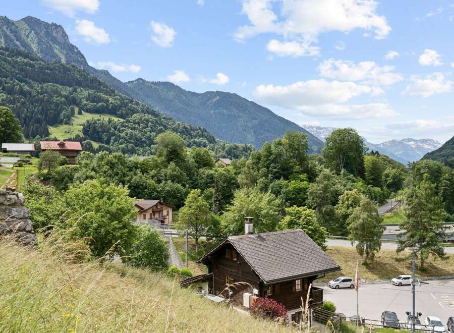 Nestled amidst the breathtaking Swiss Alps, this charming wooden chalet offers an idyllic retreat with stunning mountain views.