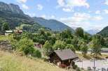 Nestled amidst the breathtaking Swiss Alps, this charming wooden chalet offers an idyllic retreat with stunning mountain views.