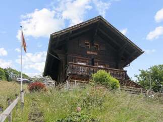 Experience rustic charm in this traditional wooden chalet, nestled on a hillside with breathtaking views.