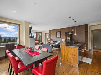 Experience breathtaking mountain views from this stunning open-concept living space, perfect for entertaining.