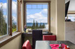 Enjoy breathtaking mountain and forest views from this dining area, perfect for morning coffee or evening meals.