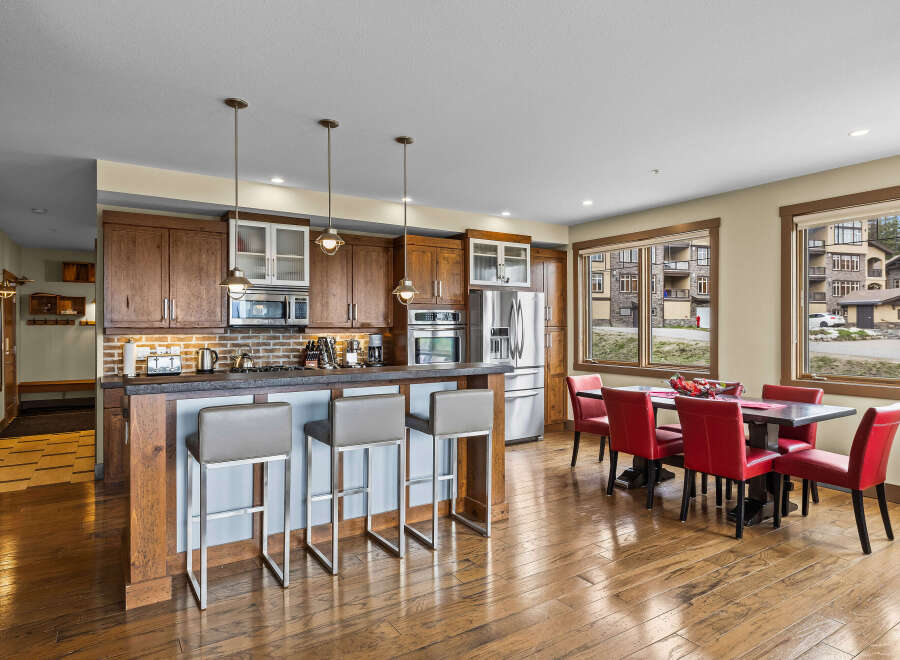 Experience modern living in this spacious open-concept kitchen and dining area, perfect for entertaining.