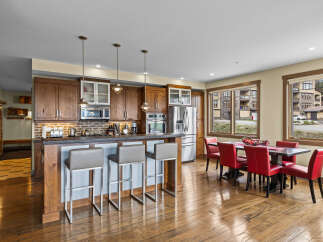 Experience modern living in this spacious open-concept kitchen and dining area, perfect for entertaining.