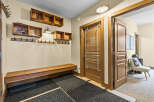 This entryway offers a practical and stylish space for organization and comfort.