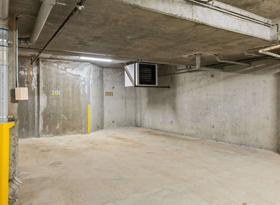Discover this spacious concrete parking space, perfect for your vehicle.