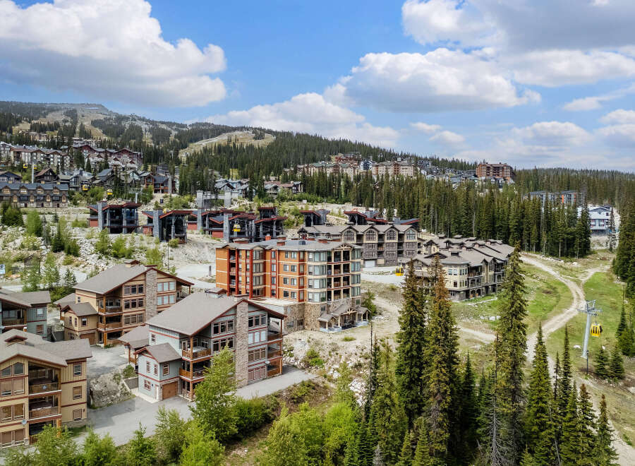 Discover luxury mountain living in this stunning ski-in/ski-out property, offering breathtaking views and unparalleled access to world-class slopes.