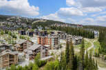 Discover luxury mountain living in this stunning ski-in/ski-out property, offering breathtaking views and unparalleled access to world-class slopes.