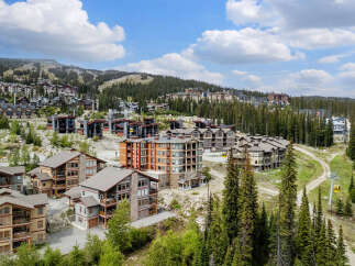 Discover luxury mountain living in this stunning ski-in/ski-out property, offering breathtaking views and unparalleled access to world-class slopes.