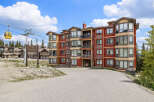 Experience luxury mountain living at The Timbers at Big White, featuring this stunning condo with panoramic views.