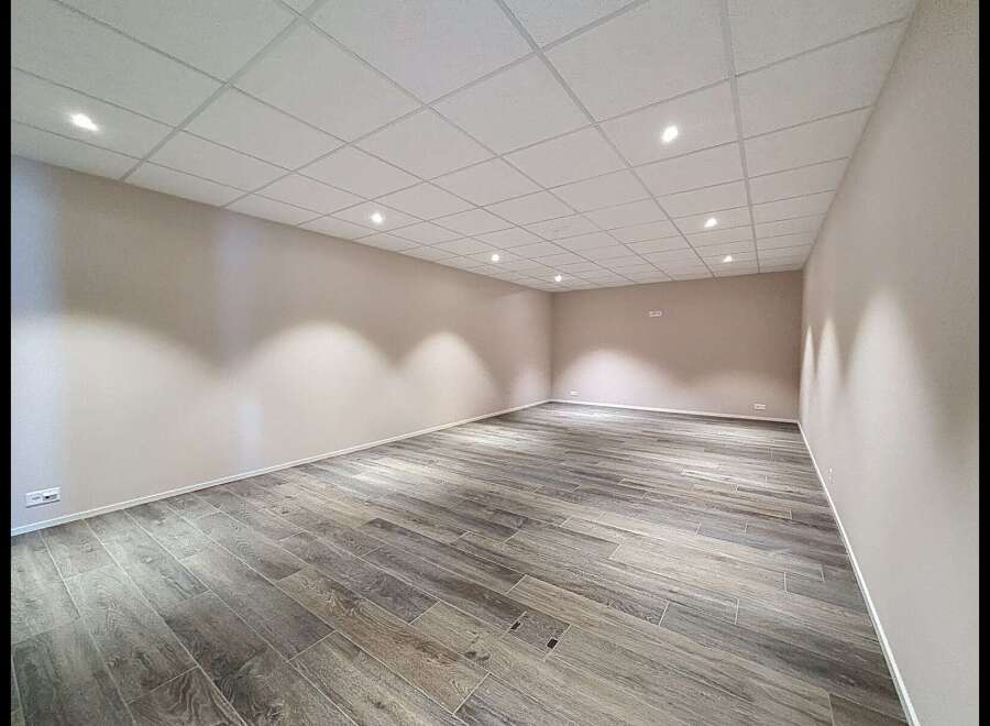 Discover this spacious and modern commercial space, featuring a clean, neutral palette perfect for any business.
