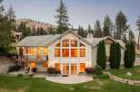 Experience luxury living in this stunning home, featuring a grand two-story great room with expansive windows that flood the space with natural light.