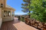 Enjoy breathtaking lake and mountain views from this expansive deck, perfect for entertaining or quiet relaxation.