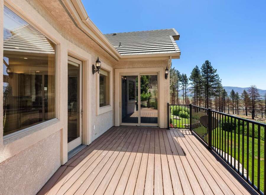 Enjoy breathtaking views from this expansive deck, perfect for outdoor entertaining or quiet relaxation.