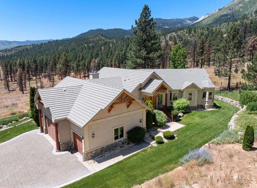 Nestled amidst a picturesque mountain landscape, this stunning home offers a perfect blend of luxury and natural beauty.