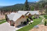 Nestled amidst a picturesque mountain landscape, this stunning home offers a perfect blend of luxury and natural beauty.