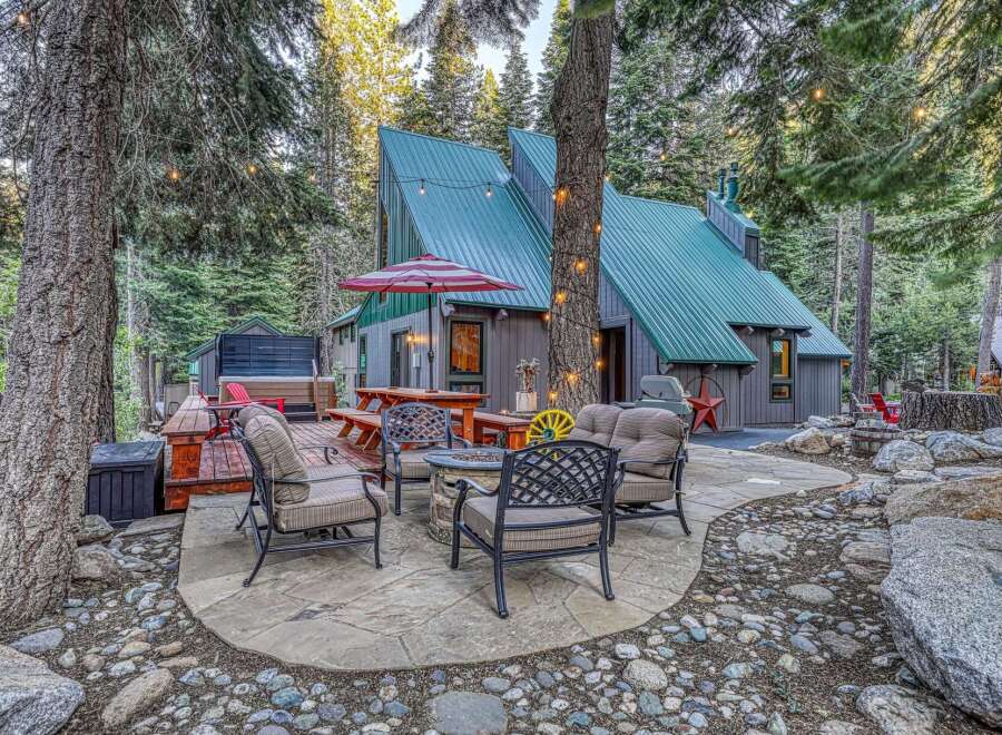 Experience the ultimate mountain retreat with this charming cabin nestled in a serene forest setting.