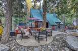 Experience the ultimate mountain retreat with this charming cabin nestled in a serene forest setting.