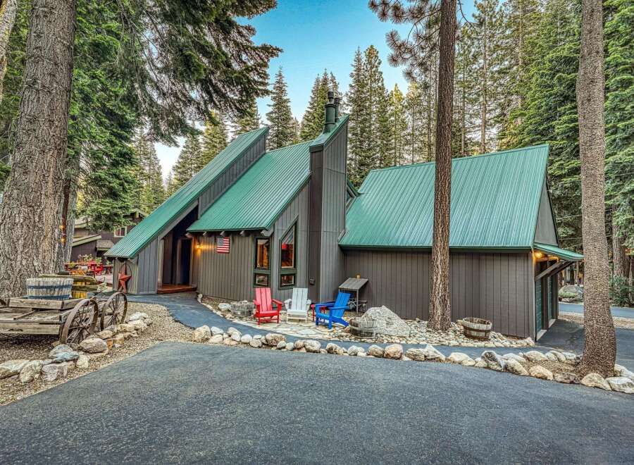 Experience mountain living in this charming A-frame cabin nestled amongst tall pine trees.