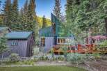 Nestled amidst a serene forest, this unique A-frame cabin offers a tranquil retreat.