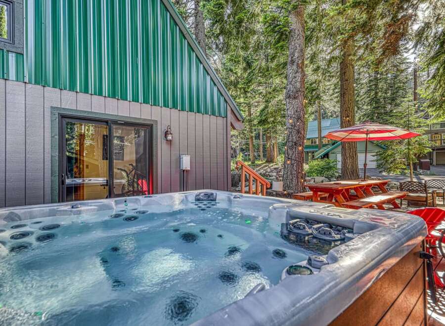 Indulge in ultimate relaxation with this luxurious hot tub, perfect for unwinding after a day of adventure.