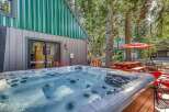 Indulge in ultimate relaxation with this luxurious hot tub, perfect for unwinding after a day of adventure.