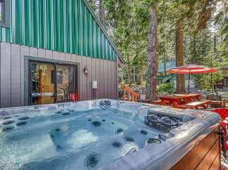 Indulge in ultimate relaxation with this luxurious hot tub, perfect for unwinding after a day of adventure.