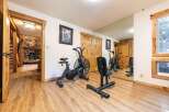 This home features a dedicated home gym space, perfect for maintaining your fitness routine without leaving the house.