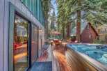 Experience ultimate relaxation in this charming cabin retreat, featuring a luxurious hot tub perfect for unwinding after a day of adventure.