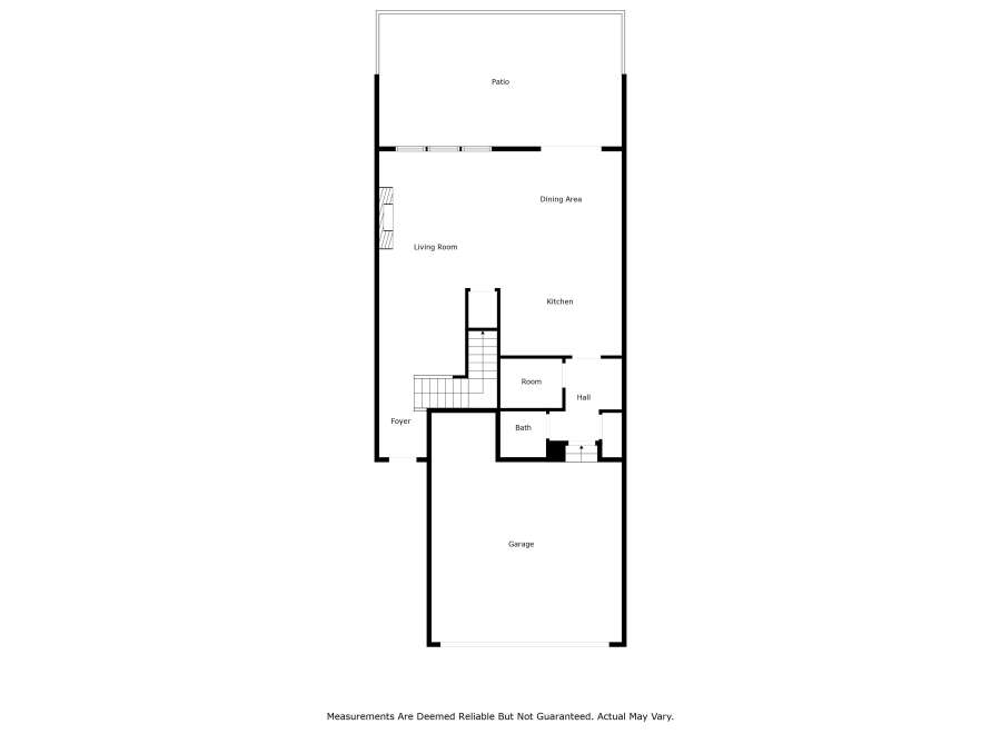 Discover this spacious floor plan featuring a large living room perfect for entertaining, flowing into a dining area and a well-appointed kitchen.