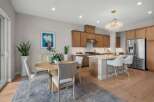 Experience modern living in this stunning open-concept kitchen and dining area, perfect for entertaining.