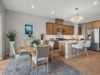 Experience modern living in this stunning open-concept kitchen and dining area, perfect for entertaining.