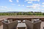 Enjoy breathtaking views from this stunning patio, perfect for outdoor entertaining.