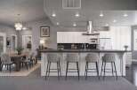 Experience modern living in this stunning open-concept kitchen and dining area.