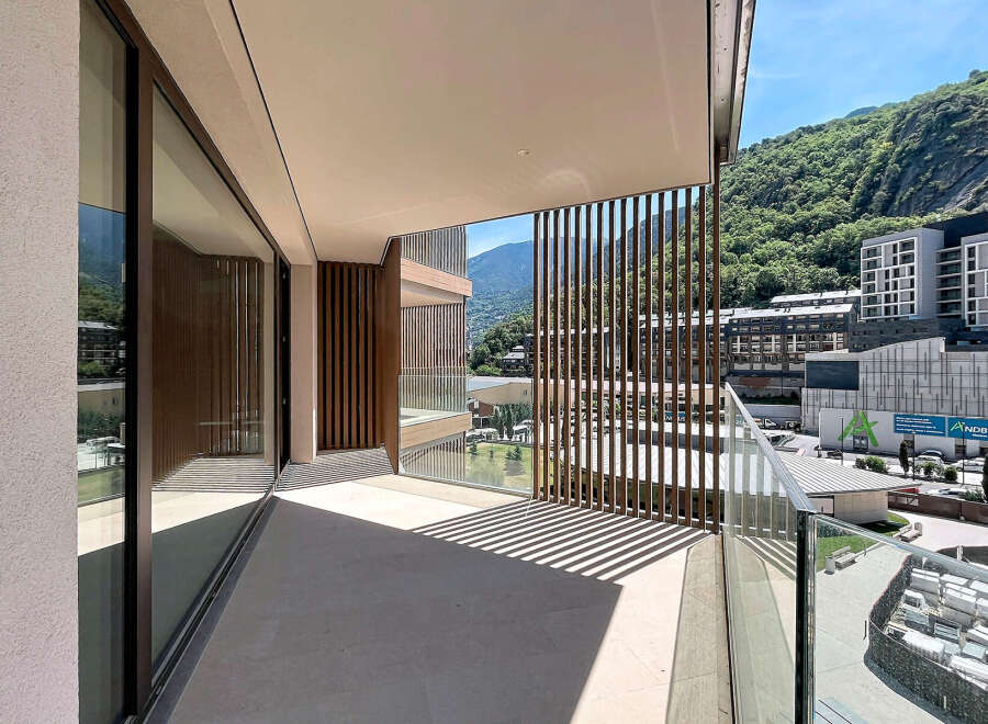 Experience modern living with this stunning balcony offering breathtaking mountain views.