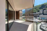 Experience modern living with this stunning balcony offering breathtaking mountain views.
