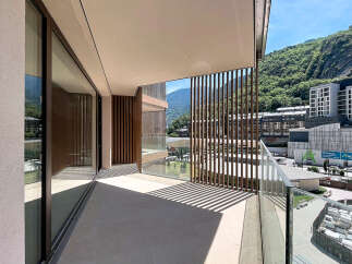 Experience modern living with this stunning balcony offering breathtaking mountain views.