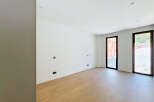 Discover this bright and airy empty room, perfect for creating your dream living space.