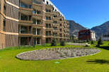 Experience modern living in this stunning apartment complex, featuring a unique architectural design with wood-paneled facades and expansive balconies offering breathtaking mountain views.