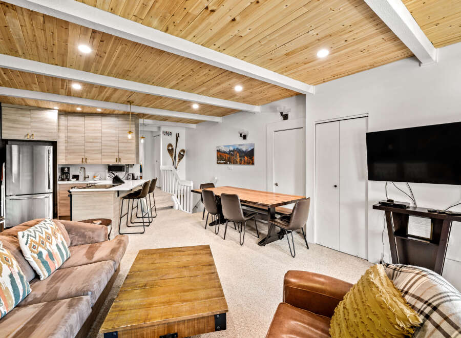 Experience modern living in this beautifully appointed space, featuring a sleek kitchen with stainless steel appliances and ample cabinetry.
