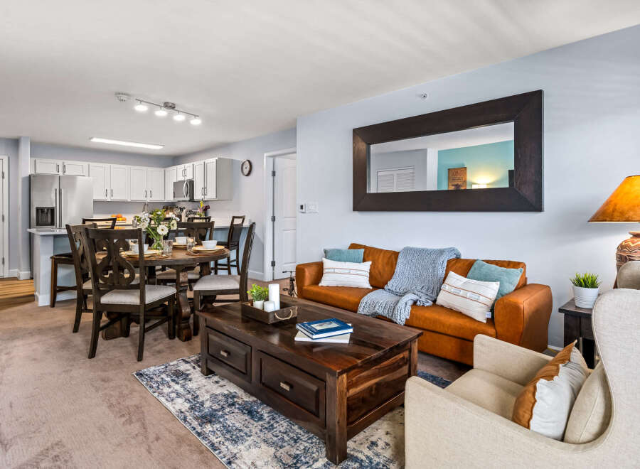 Experience modern living in this beautifully appointed apartment, featuring a spacious open-concept living and dining area perfect for entertaining.