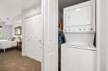 Discover convenience with this stacked washer and dryer unit, perfect for maximizing space in your home.