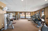 Stay active and energized in this well-equipped fitness center, featuring a variety of cardio machines like treadmills and ellipticals, alongside strength training equipment.