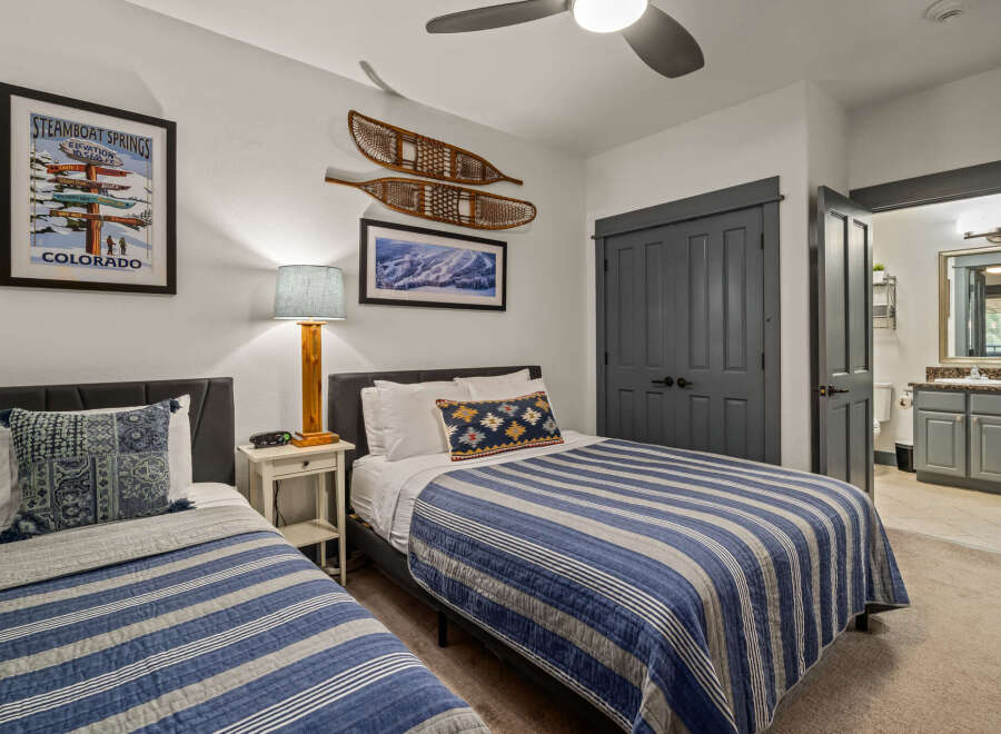 This charming bedroom features two comfortable twin beds, perfect for accommodating guests or family.