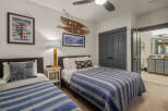 This charming bedroom features two comfortable twin beds, perfect for accommodating guests or family.
