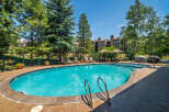 Enjoy a refreshing dip in this stunning outdoor swimming pool, perfect for relaxation and fun.