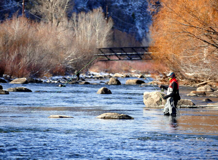 Experience the tranquility of fly fishing in this picturesque riverfront property.