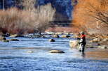 Experience the tranquility of fly fishing in this picturesque riverfront property.