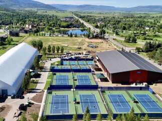 Experience world-class tennis at this expansive facility featuring numerous outdoor courts and a large indoor arena for year-round play.