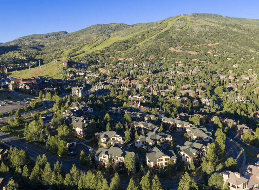 Nestled amidst lush greenery and towering trees, this stunning mountain community offers a serene escape with breathtaking views.