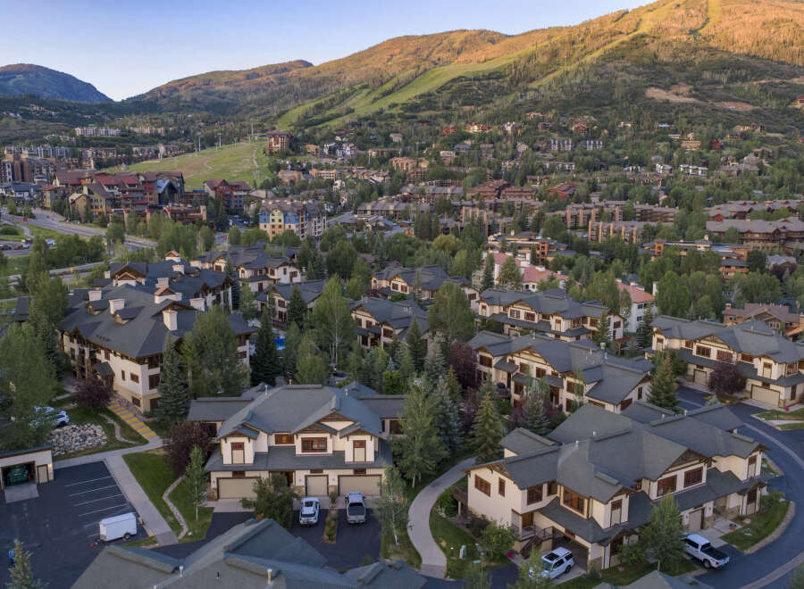 Discover luxury mountain living in this stunning property, nestled amidst a picturesque landscape with breathtaking views of rolling hills and ski slopes.